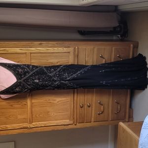 Beaded & Embellish Black Mermaid Evening gown floor length. Low Back.